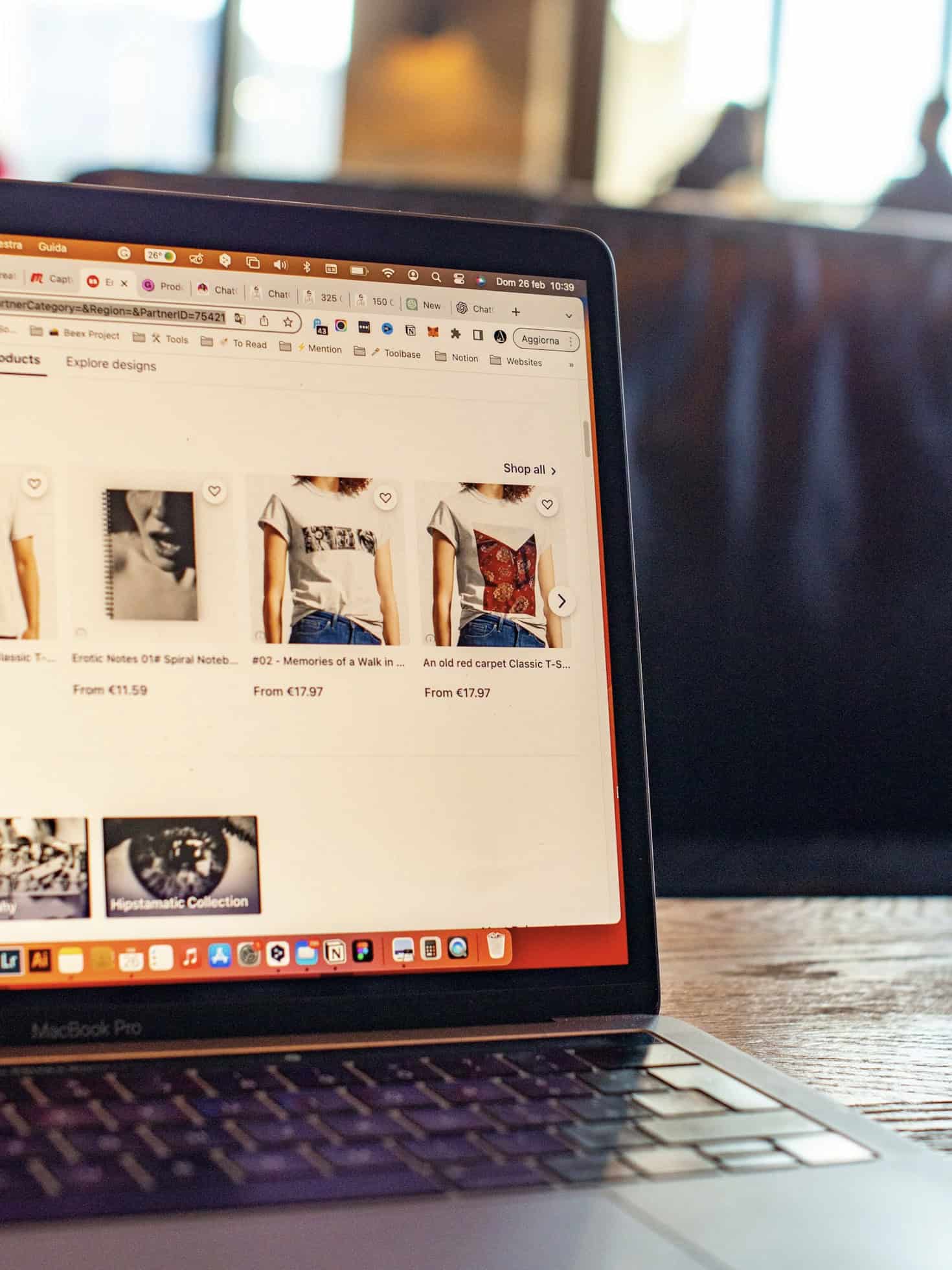 Laptop screen displaying product search results on Shoppersatings website.